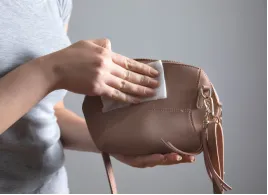 Daily Cleaning: The First Step in leather bag care tips