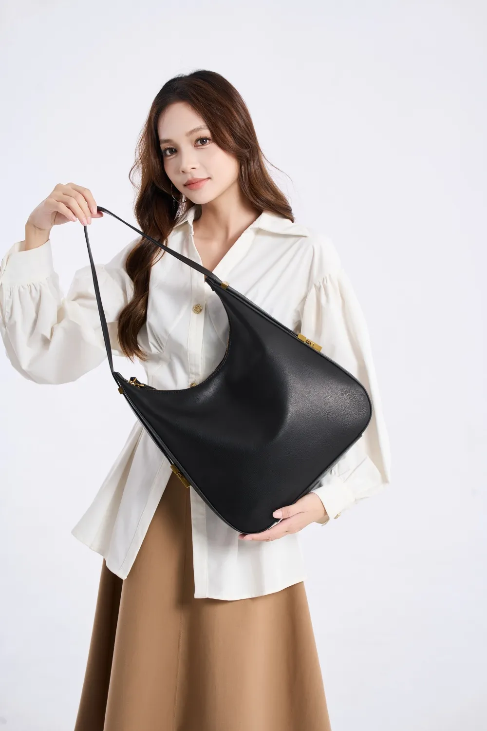 The Quest for the Perfect Lightweight Leather Crossbody Bag