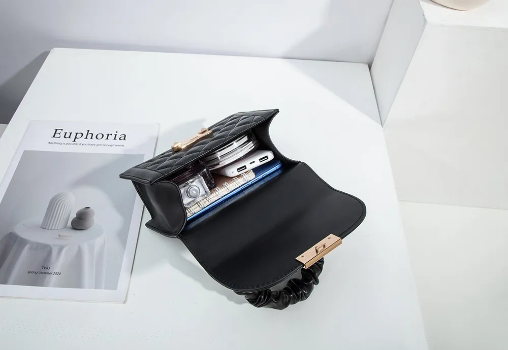 This quilted handbag from BALIYA, boasting sleek diamond stitching, effortlessly swallows a phone, power bank, earphones, and other small essentials.