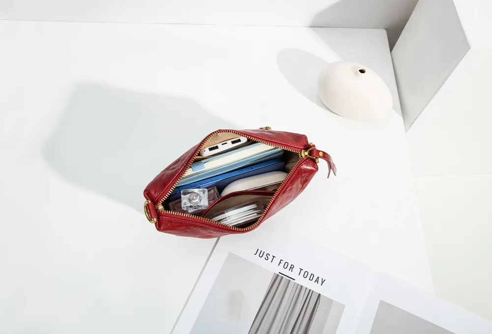 red wrinkled waxed leather messenger bag