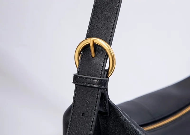 The adjustable shoulder strap hardware of the women's bag features high - quality alloy buckles, finely electroplated for corrosion resistance.