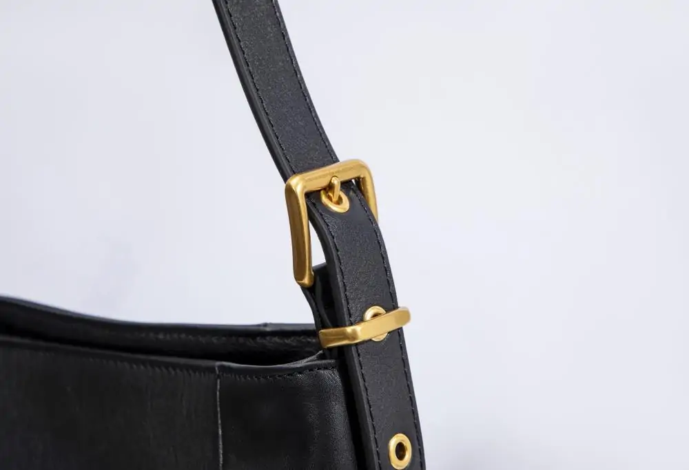 The hardware on adjustable straps of genuine leather tote bags is sturdy, often made of brass or stainless steel, ensuring smooth adjustment and long - lasting use.
