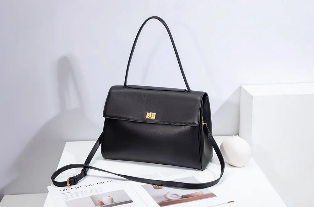 The red tote bag offers ample space for daily essentials, books, and a laptop, combining style with practicality for versatile use