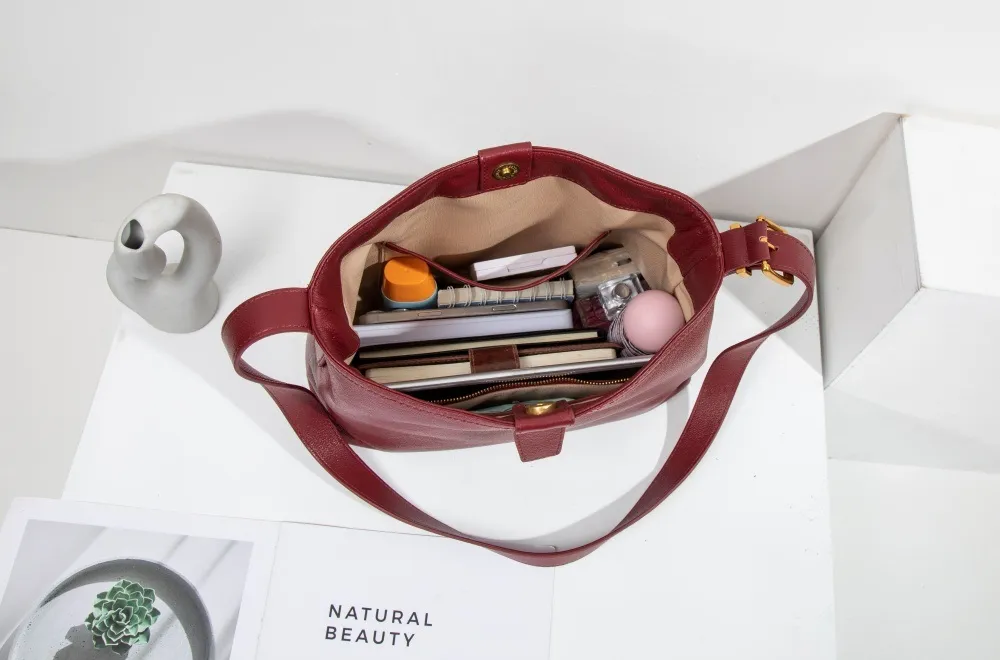 Genuine leather women's shoulder bag—spacious enough to hold plenty, merging style with ample storage.