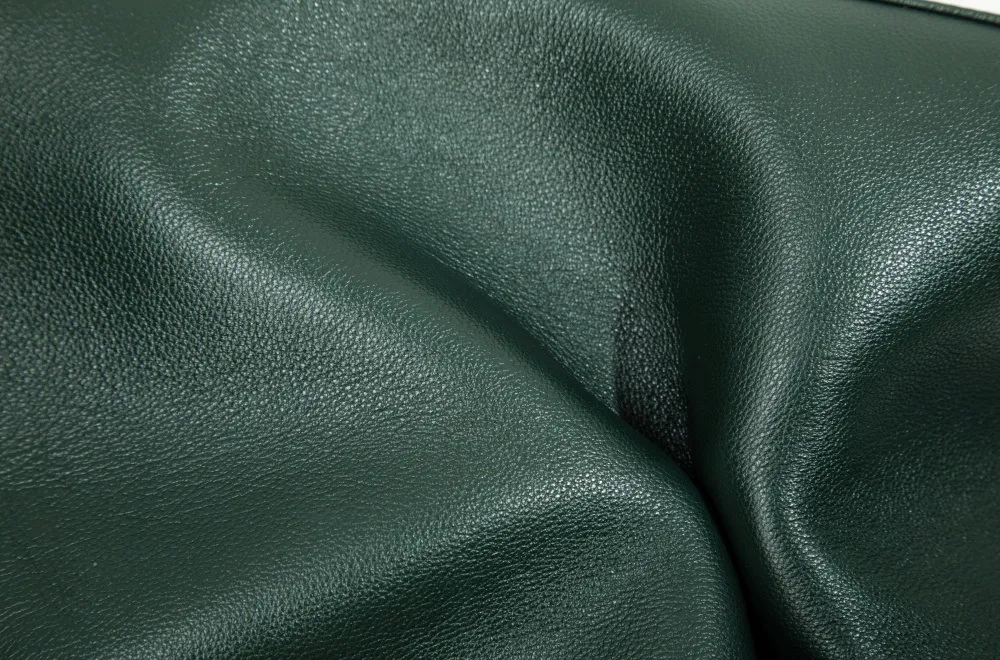 Premium cowhide for this leather bag—smooth, durable, ages beautifully. Rich texture, pure luxury in every touch.