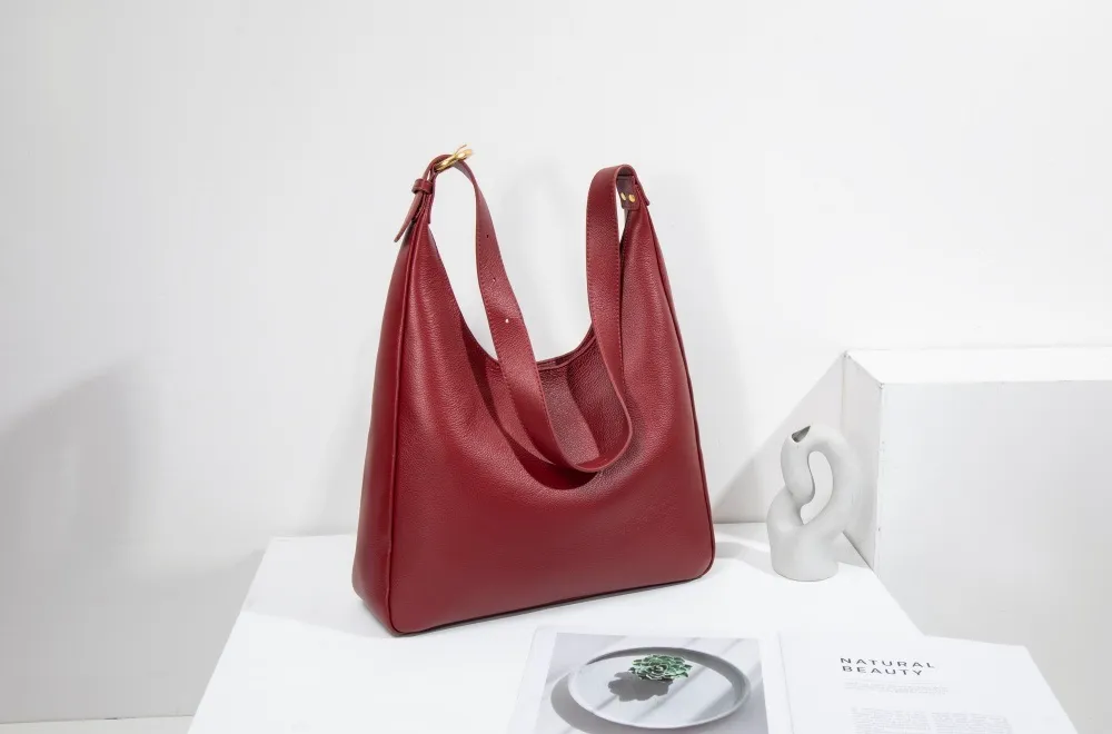 A large women's tote—roomy enough for work, travel, or daily hauls. Structured yet lightweight, with sleek lines and practical pockets. Combines functionality with effortless style for every occasion