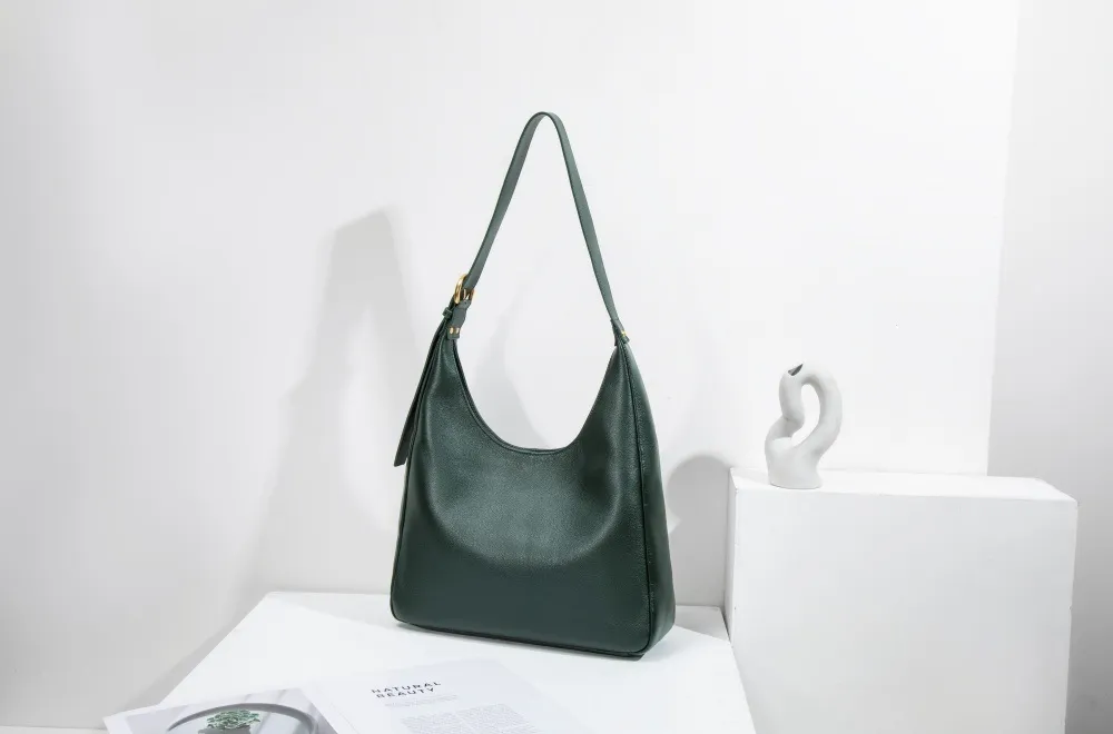 A large women's tote—roomy enough for work, travel, or daily hauls. Structured yet lightweight, with sleek lines and practical pockets. Combines functionality with effortless style for every occasion